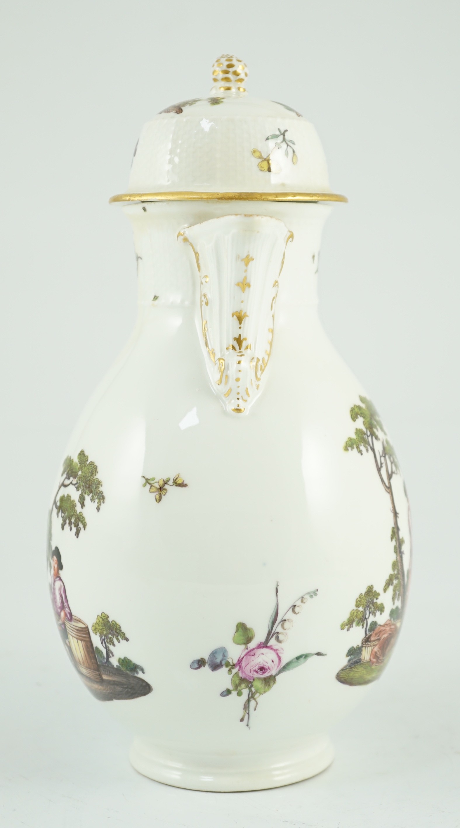 A Meissen coffee pot and cover, c.1760, 23cm high, discoloured restoration